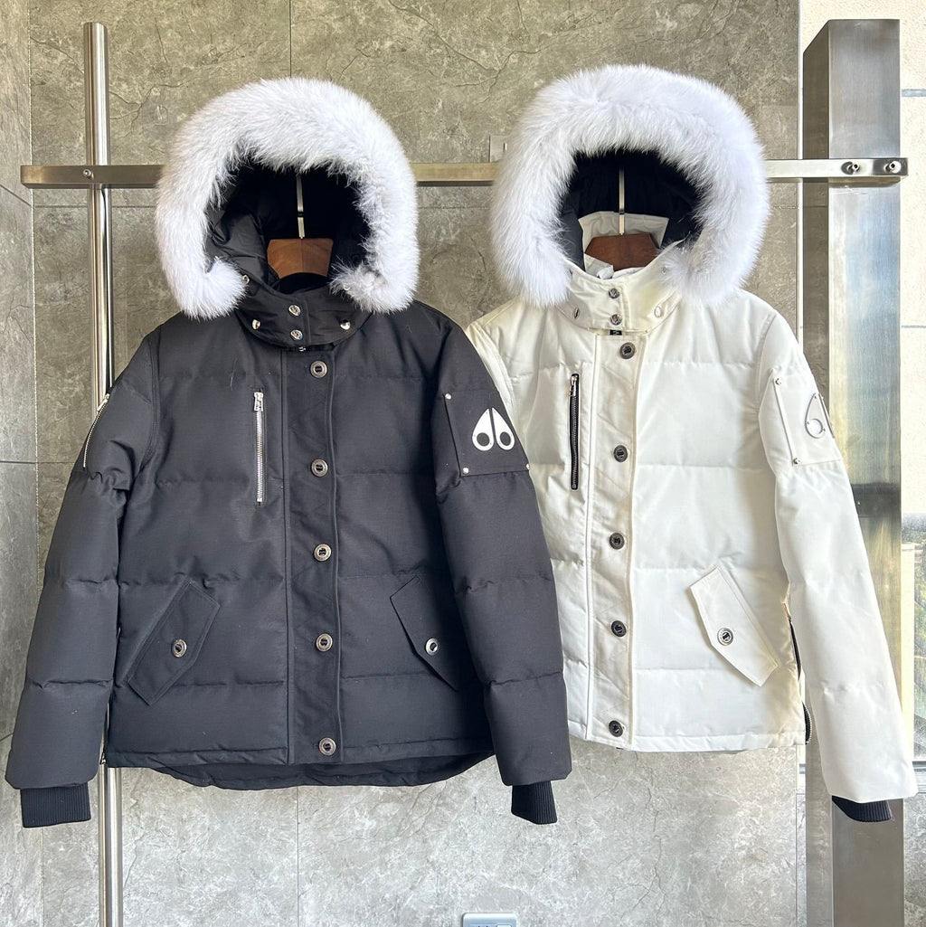 Chaqueta acolchada con capucha de piel
