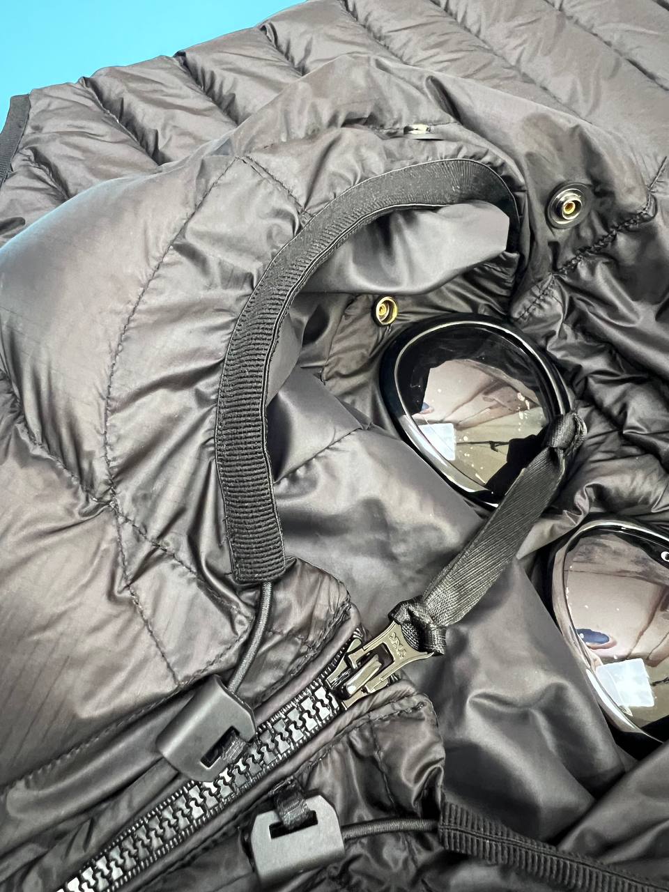 Chaleco de plumas premium para gafas