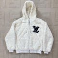 Sudadera blanca con cremallera y piel sintética