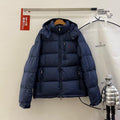 Chaqueta acolchada con capucha azul marino