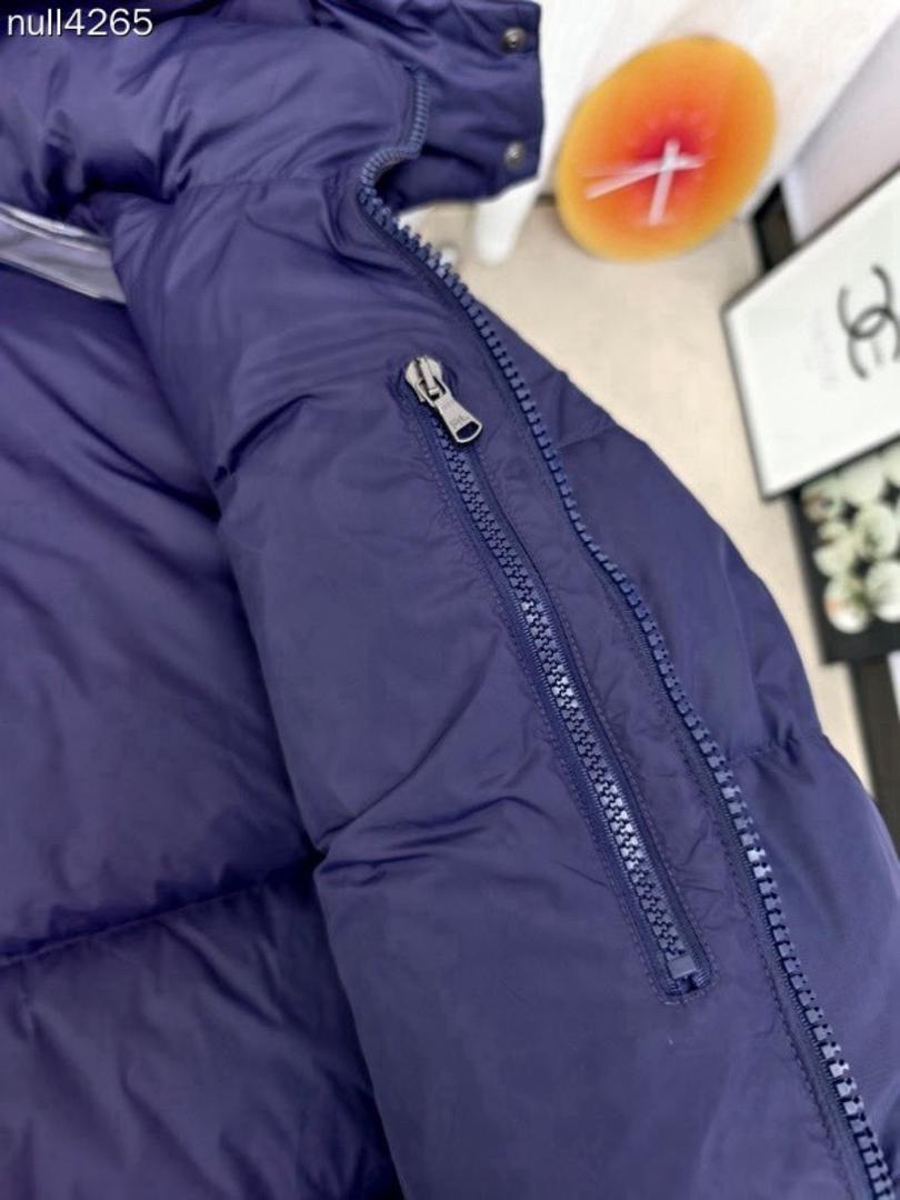 Chaqueta acolchada con capucha azul