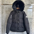 Chaqueta acolchada con capucha de piel