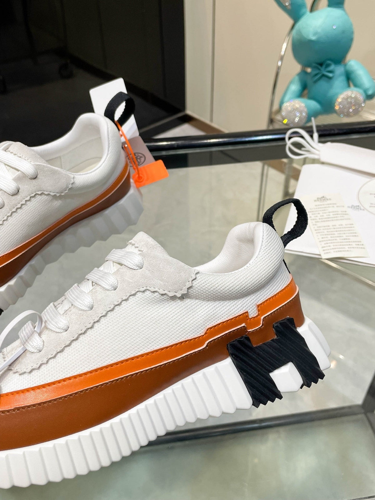 Zapatillas de cuero a rayas H