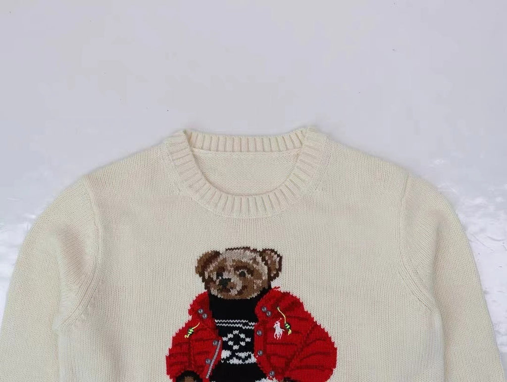 Suéter de punto color crema con forma de oso de invierno