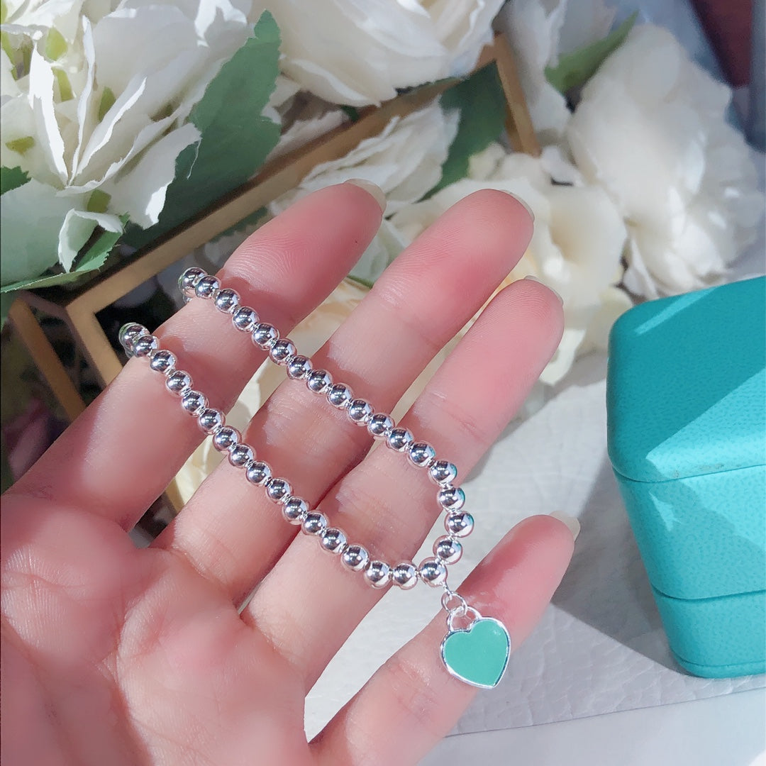 Pulsera de esmalte de doble corazón