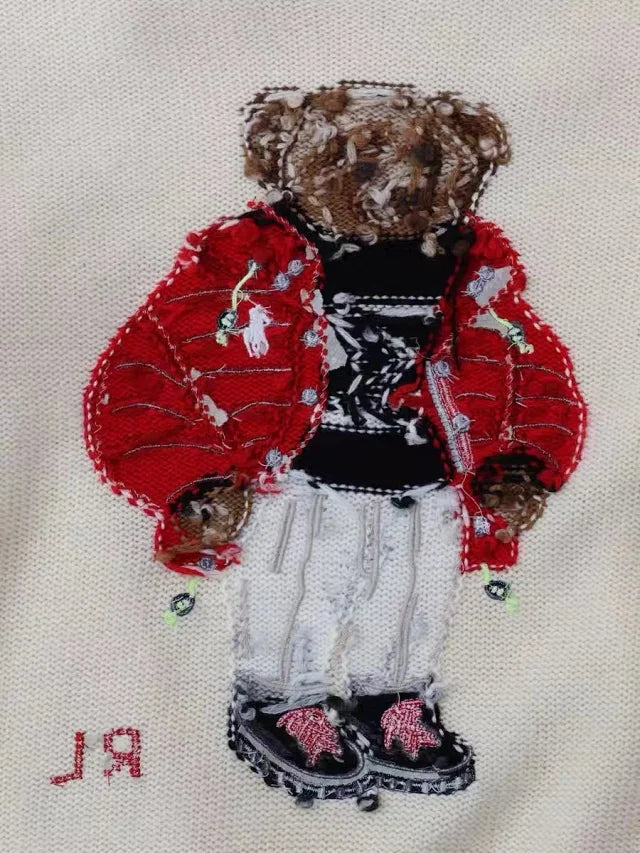 Suéter de punto color crema con forma de oso de invierno