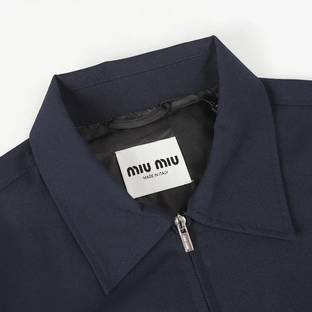 Chaqueta azul marino con cremallera