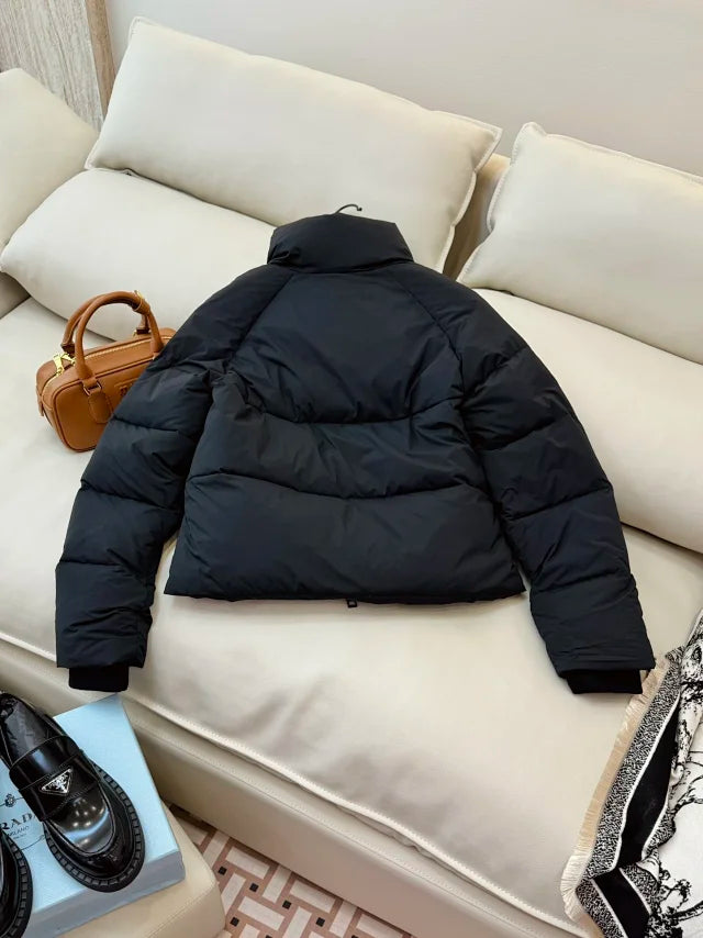 Chaqueta corta de plumas